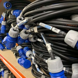 Single phase 16 amp plug and play extension cable within ShowEquip Limited storage warehouse.